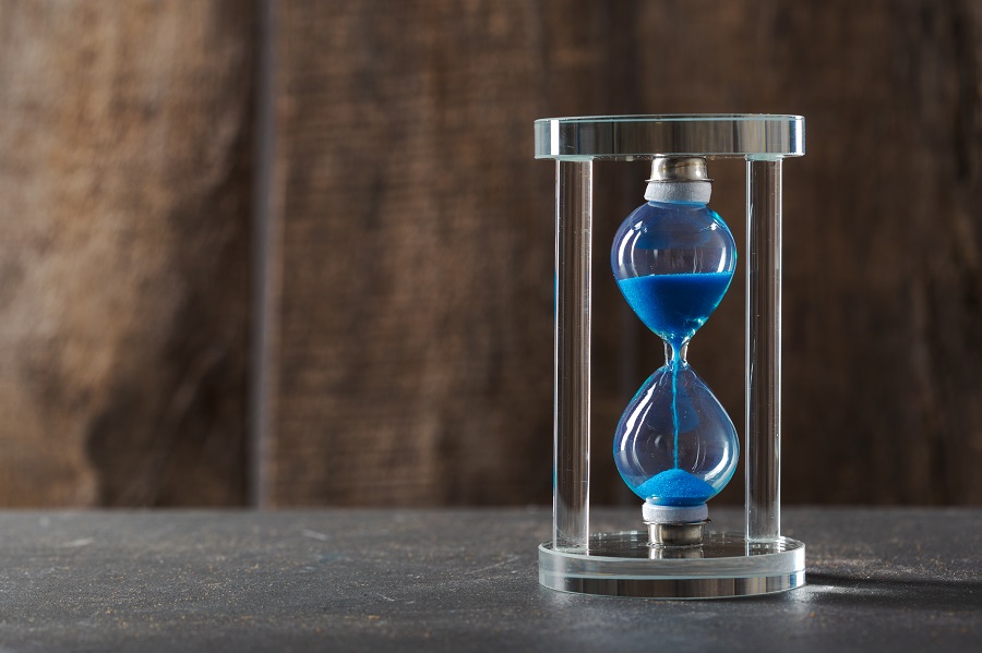 time-is-passing-blue-hourglass-close-up.jpg